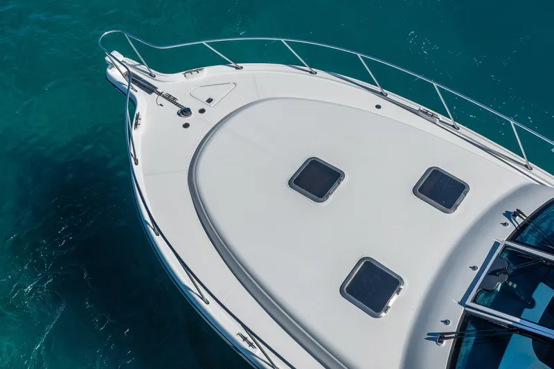 Blue Pearl Yacht Photos Pics 2004 Tiara Yachts 4200 Open boat deck on clear blue water.