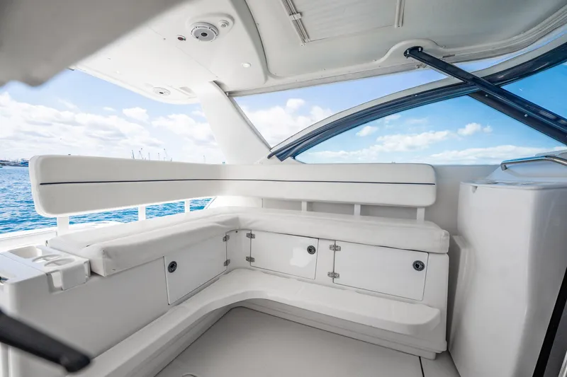 Blue Pearl Yacht Photos Pics 2004 Tiara Yachts 4200 Open interior with white seating and ocean view.