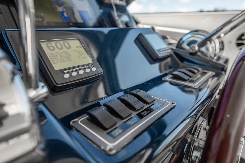 Blue Pearl Yacht Photos Pics 2004 Tiara Yachts 4200 Open dashboard with digital display and controls.