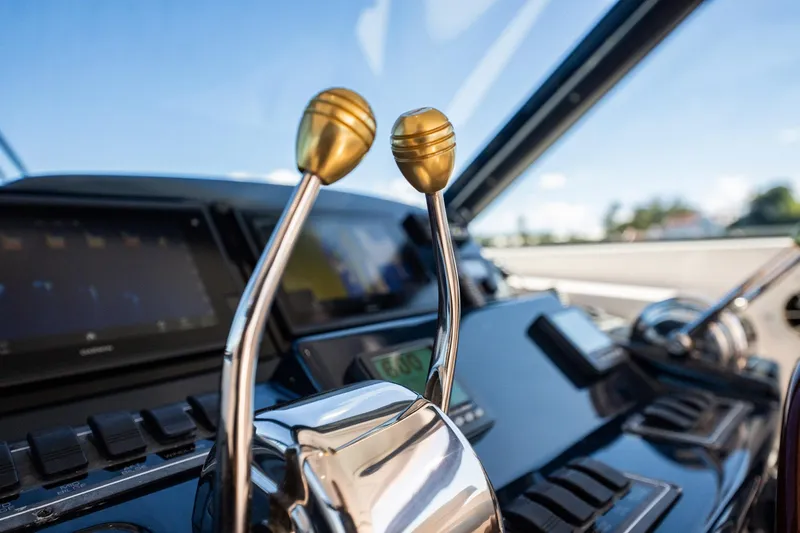 Blue Pearl Yacht Photos Pics Close-up of 2004 Tiara Yachts 4200 Open helm controls and dashboard.