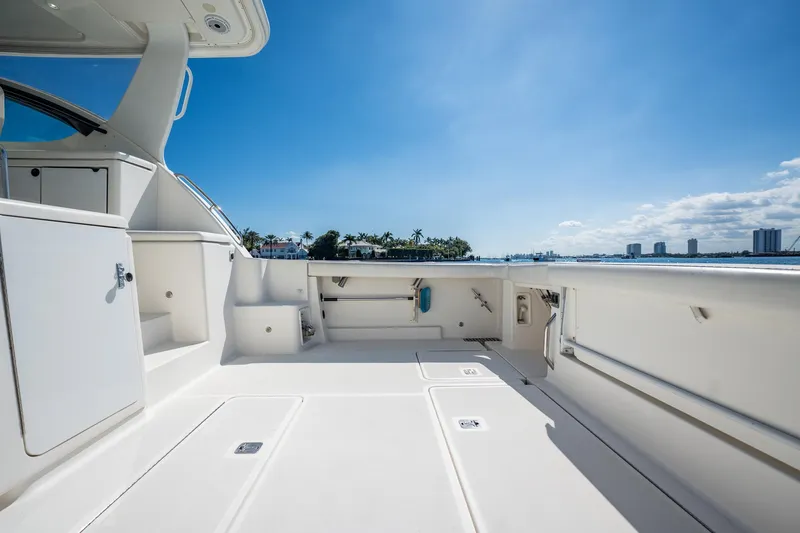 Blue Pearl Yacht Photos Pics 2004 Tiara Yachts 4200 Open deck with ocean view, clear sky, and modern design.