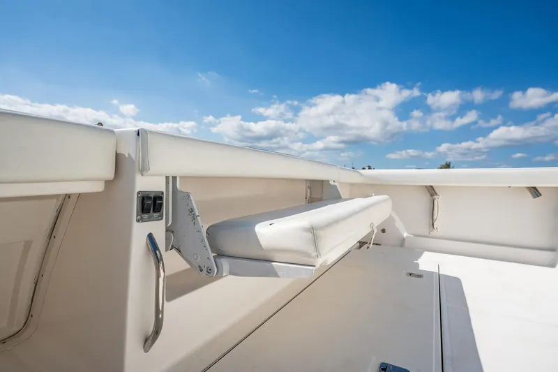 Blue Pearl Yacht Photos Pics 2004 Tiara Yachts 4200 Open deck with seating under clear blue sky.