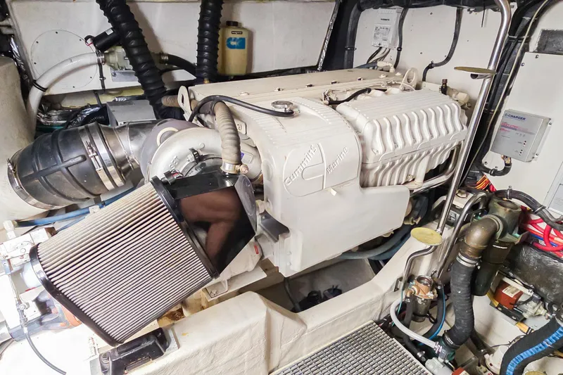 Blue Pearl Yacht Photos Pics Engine room of 2004 Tiara Yachts 4200 Open, featuring Cummins Marine engine.