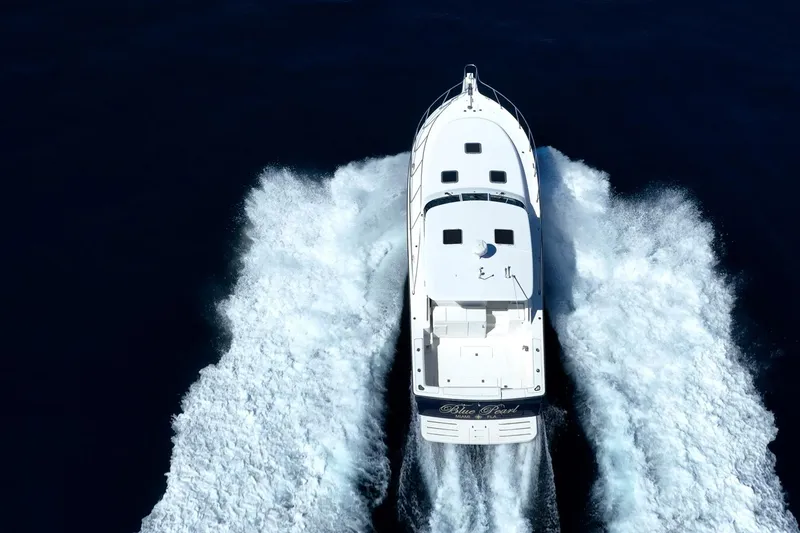 Blue Pearl Yacht Photos Pics 2004 Tiara Yachts 4200 Open cruising on open water, aerial view.