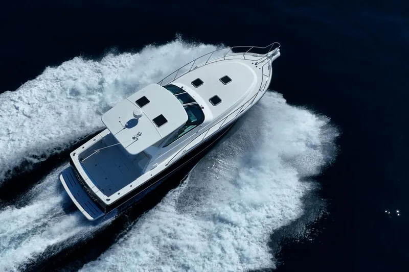 Blue Pearl Yacht Photos Pics 2004 Tiara Yachts 4200 Open cruising on open water, aerial view.