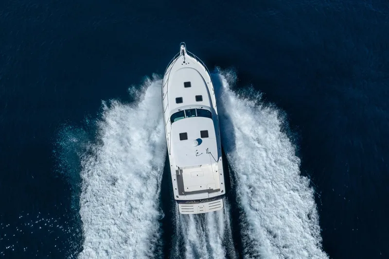 Blue Pearl Yacht Photos Pics Aerial view of 2004 Tiara Yachts 4200 Open cruising on the ocean.