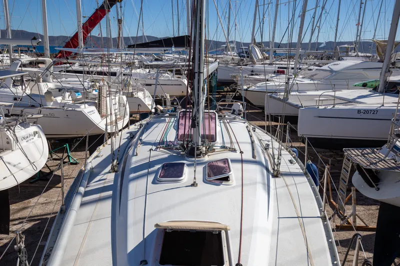  Yacht Photos Pics Sailboats docked in a marina, featuring a 2005 Grand Soleil 43 yacht.