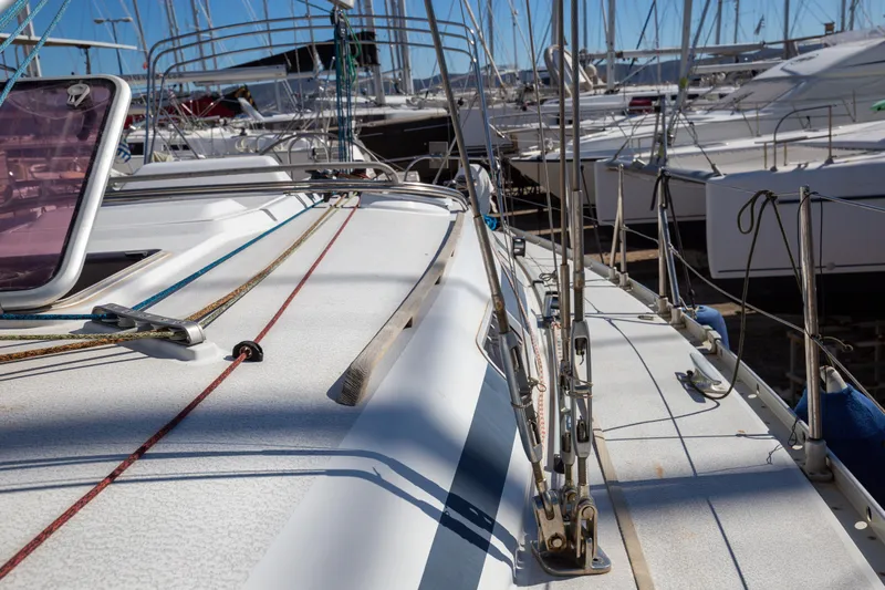  Yacht Photos Pics Deck view of a 2005 Grand Soleil 43 sailboat in a marina.