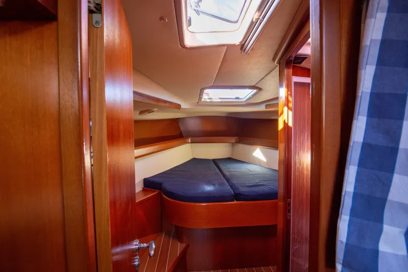  Yacht Photos Pics Interior cabin of 2005 Grand Soleil 43 yacht with wooden finish and skylight.
