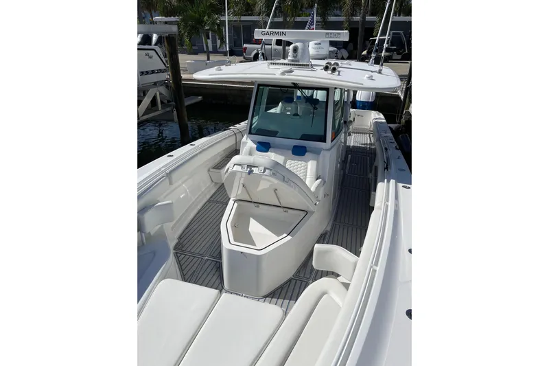  Yacht Photos Pics 2019 HCB 42 Siesta boat with open deck and seating, docked at marina.