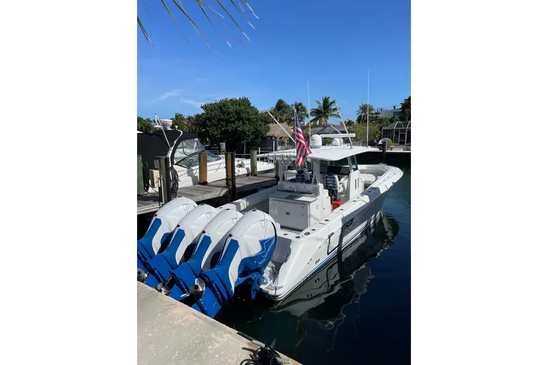  Yacht Photos Pics 2019 HCB 42 Siesta boat docked with four powerful outboard engines.