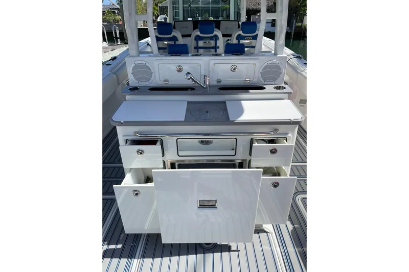  Yacht Photos Pics 2019 HCB 42 Siesta boat interior with open storage compartments and seating.