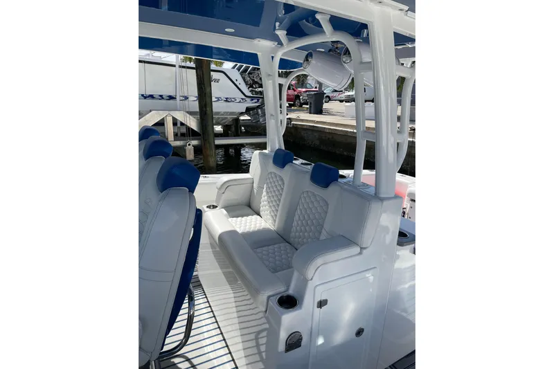  Yacht Photos Pics 2019 HCB 42 Siesta boat interior with white and blue seating.