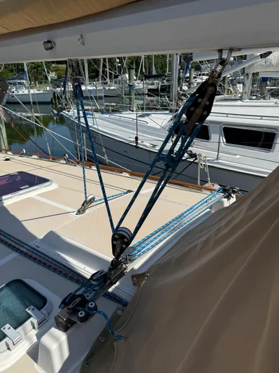 Moonsplash Yacht Photos Pics 1987 Island Packet 38 sailboat deck with rigging and marina view.