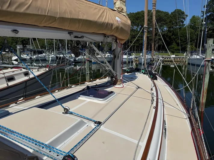 Moonsplash Yacht Photos Pics 1987 Island Packet 38 sailboat deck with rigging in marina setting.