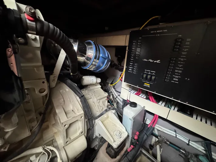 Dani Mar Yacht Photos Pics Engine room of 2003 Sea Ray 500 Sundancer with control panel and mechanical components.