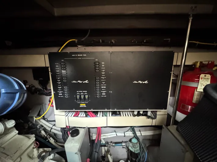Dani Mar Yacht Photos Pics Electrical panel in a 2003 Sea Ray 500 Sundancer boat engine room.