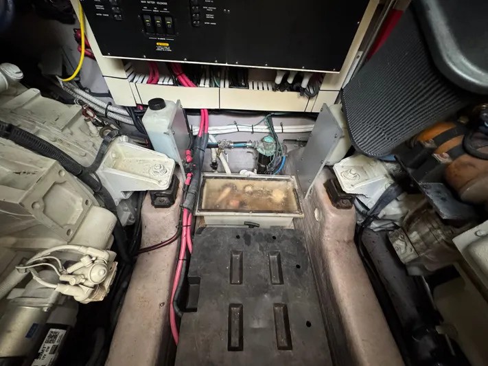 Dani Mar Yacht Photos Pics Engine room of a 2003 Sea Ray 500 Sundancer with visible components and wiring.