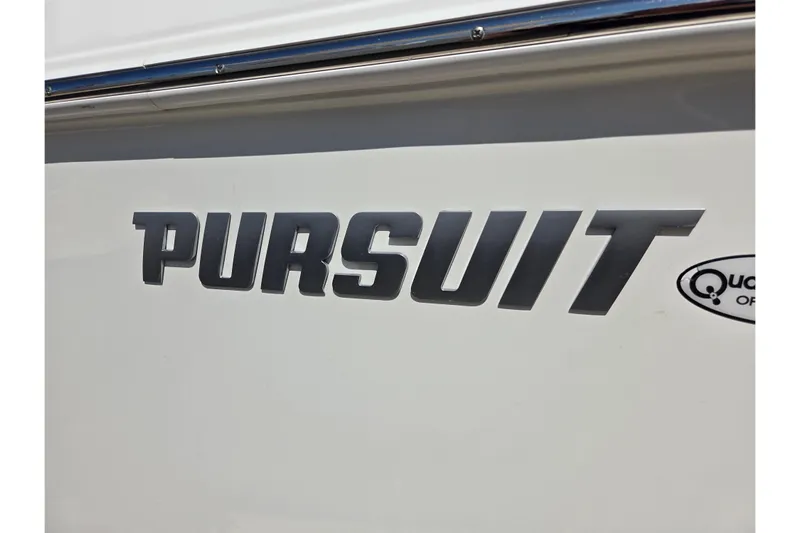  Yacht Photos Pics 2022 Pursuit S 268 Sport boat logo on white surface.