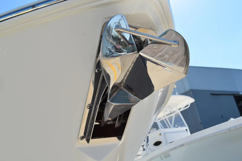  Yacht Photos Pics 2022 Pursuit S 268 Sport boat anchor detail in sunlight.