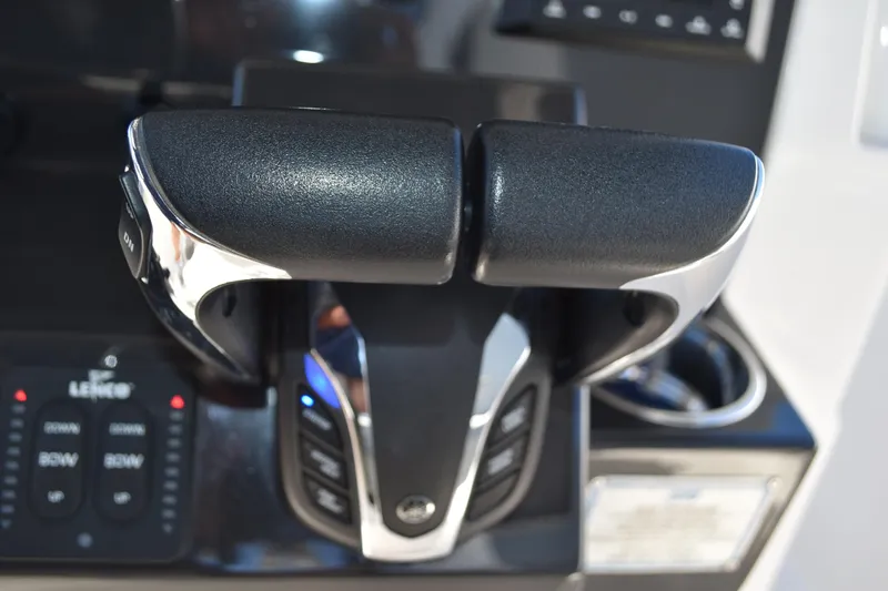  Yacht Photos Pics Throttle controls of a 2022 Pursuit S 268 Sport boat.