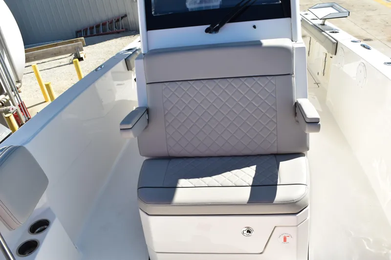  Yacht Photos Pics 2022 Pursuit S 268 Sport boat with cushioned seating and armrests.