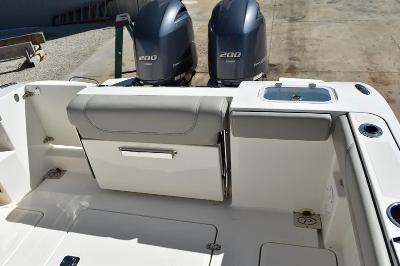  Yacht Photos Pics 2022 Pursuit S 268 Sport boat with twin Yamaha 200 engines, featuring a sleek deck design.