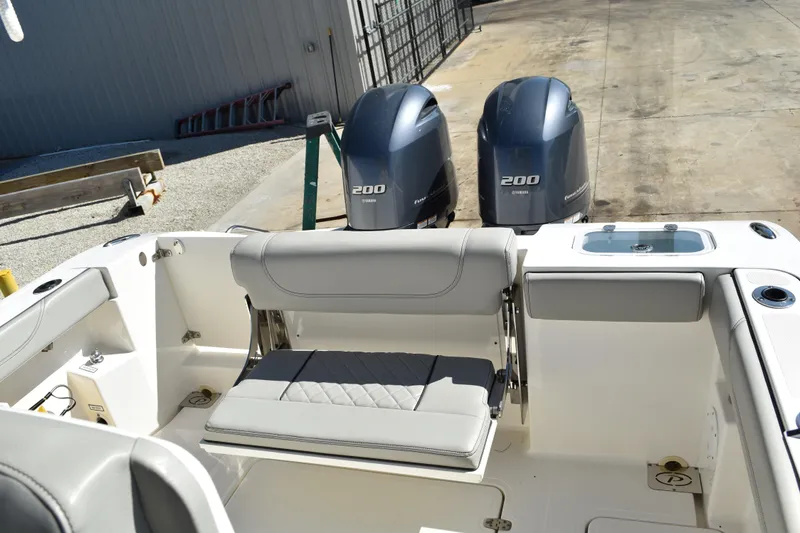  Yacht Photos Pics 2022 Pursuit S 268 Sport boat with dual Yamaha 200 engines and cushioned seating.