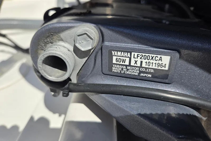  Yacht Photos Pics Close-up of Yamaha LF200XCA engine part on 2022 Pursuit S 268 Sport boat.