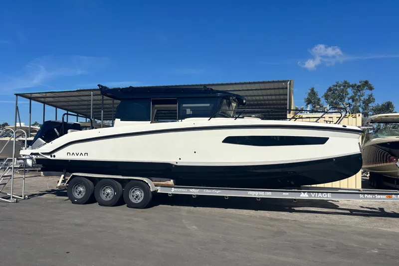  Yacht Photos Pics 2026 Navan C30 boat on trailer under clear blue sky.