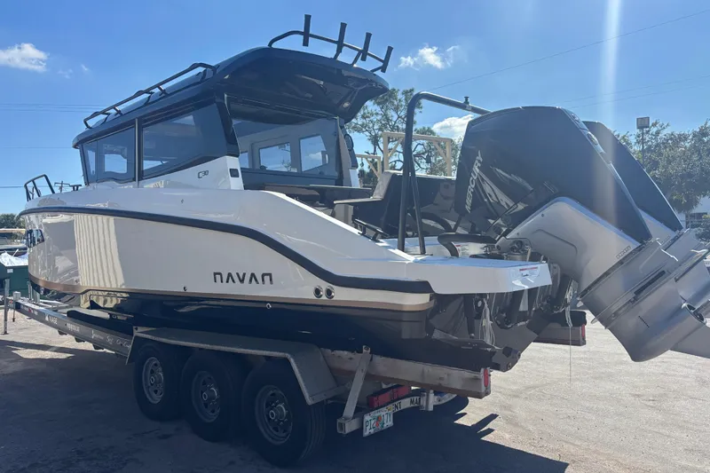  Yacht Photos Pics 2026 Navan C30 boat on trailer with dual Mercury outboard engines.
