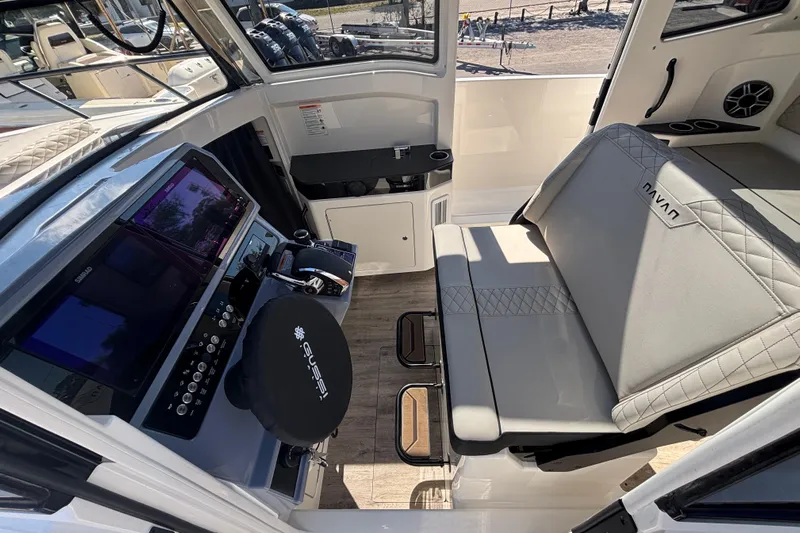  Yacht Photos Pics Interior of 2026 Navan C30 boat with modern controls and seating.