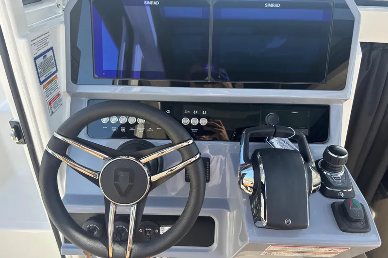  Yacht Photos Pics Steering console of 2026 Navan C30 boat with advanced controls and dual screens.