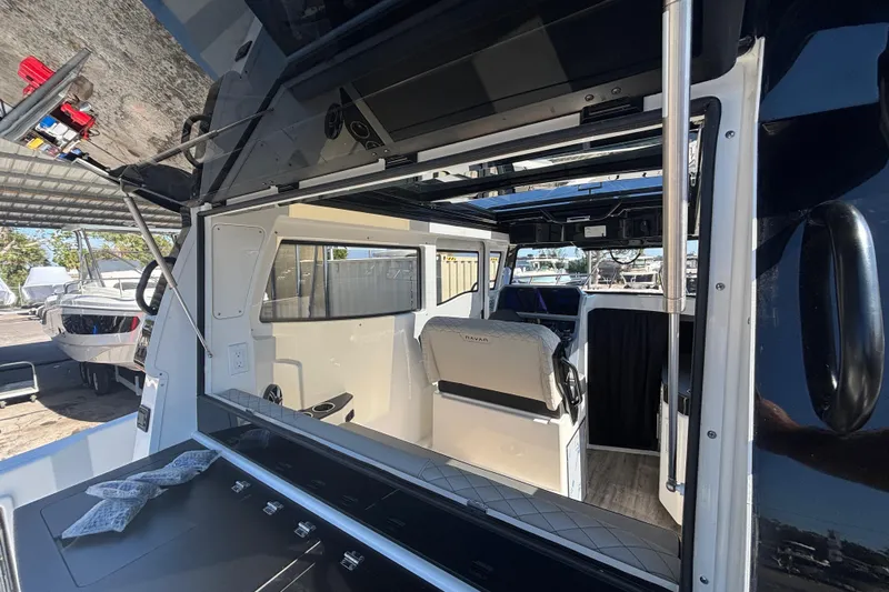  Yacht Photos Pics Interior view of 2026 Navan C30 boat, showcasing seating and open cabin design.