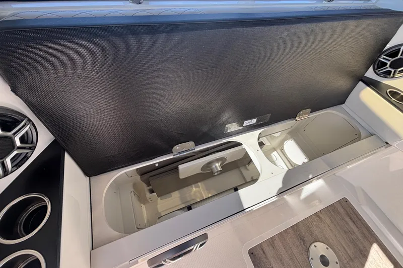  Yacht Photos Pics 2026 Navan C30 boat interior storage compartment with cup holders and speakers.