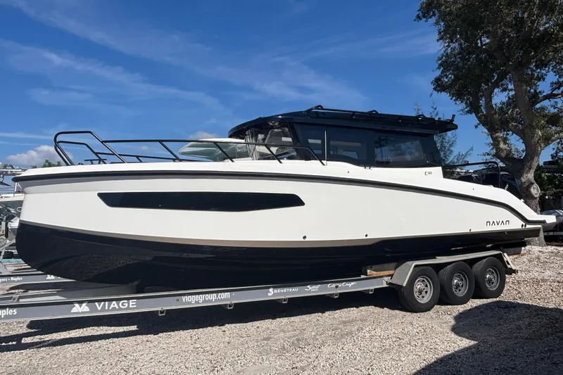  Yacht Photos Pics 2026 Navan C30 boat on trailer under clear blue sky.