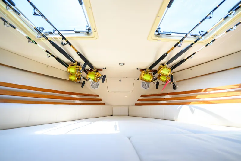 Sur Reel Yacht Photos Pics Interior of 2003 Grady-White Express 330 boat with fishing rods stored overhead.
