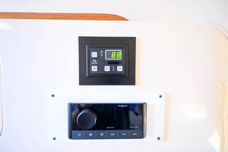 Sur Reel Yacht Photos Pics Control panel and stereo system on 2003 Grady-White Express 330 boat.