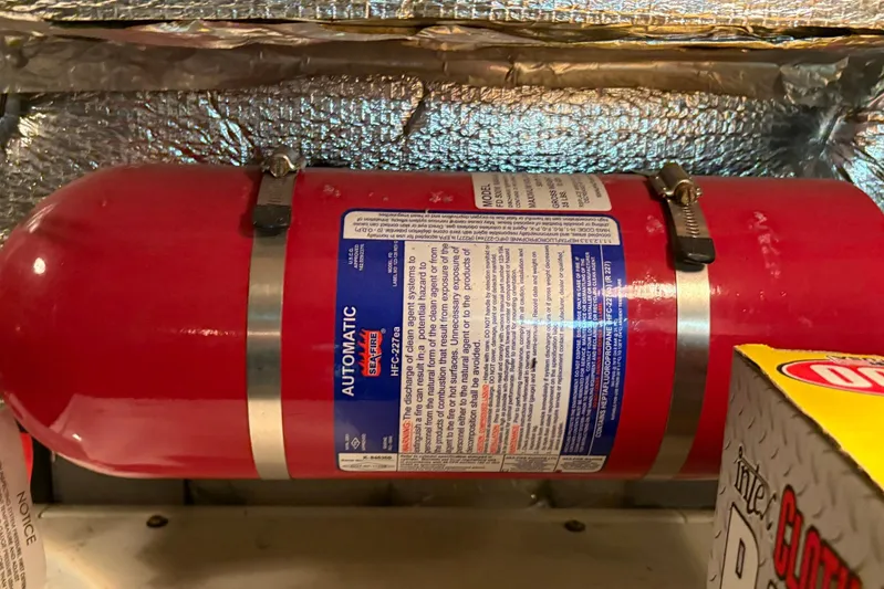 Lola's Ark III Yacht Photos Pics Automatic fire extinguisher in 2001 Silverton 453 Motor Yacht engine room.