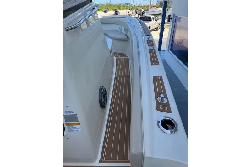  Yacht Photos Pics 2018 Chris-Craft Catalina 30 boat deck with wood accents and sleek design.