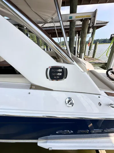 Yacht Photos Pics 2019 Regal 29 OBX boat with Power Tower feature docked by the water.