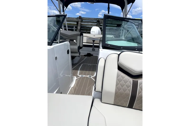  Yacht Photos Pics 2023 Monterey 275SS Super Sport boat interior with luxurious seating and sleek design.