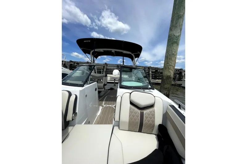  Yacht Photos Pics 2023 Monterey 275SS Super Sport boat interior with luxurious seating and sleek design.