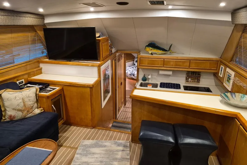 Reel Dreams Yacht Photos Pics Interior of a 1995 Bertram 43 Convertible yacht with modern amenities.