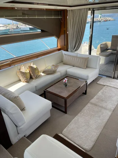 Yacht Photos Pics Luxurious interior of 2012 Princess 64 FLY yacht with elegant seating and sea view.