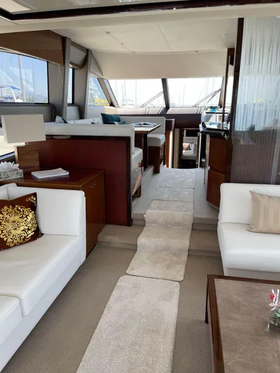  Yacht Photos Pics Luxurious interior of 2012 Princess 64 FLY yacht with elegant seating and modern decor.