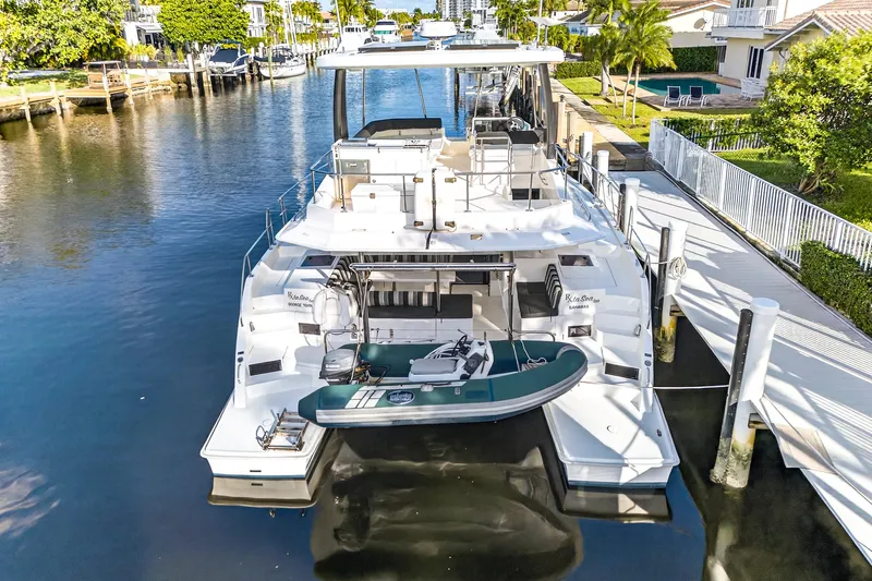  Yacht Photos Pics 2017 Leopard 43 Powercat yacht docked in a scenic waterfront location.