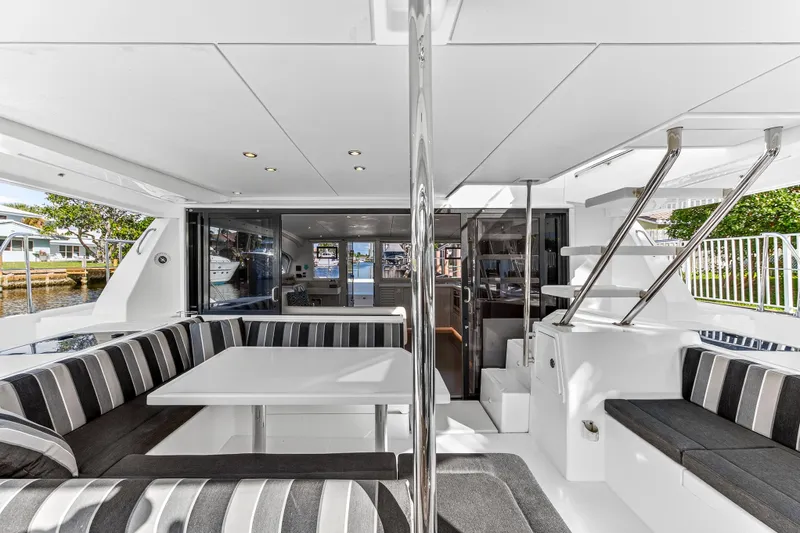  Yacht Photos Pics Luxurious interior of 2017 Leopard 43 Powercat with modern seating and sleek design.