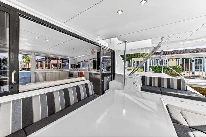  Yacht Photos Pics 2017 Leopard 43 Powercat interior with modern seating and open kitchen layout.