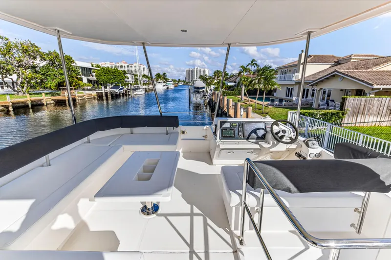  Yacht Photos Pics 2017 Leopard 43 Powercat yacht interior with spacious seating and modern navigation equipment.